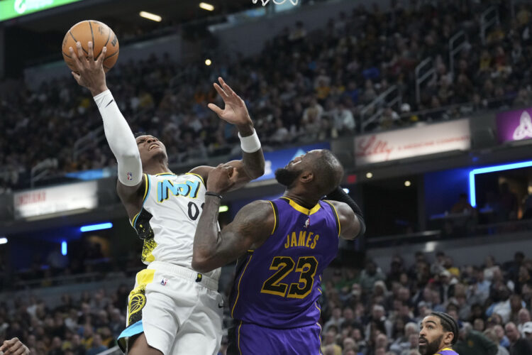 LeBron James has big finish to lift Lakers past Pacers and extend record scoring streak